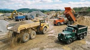 Haul trucks and loaders working a RockProsUSA quarry